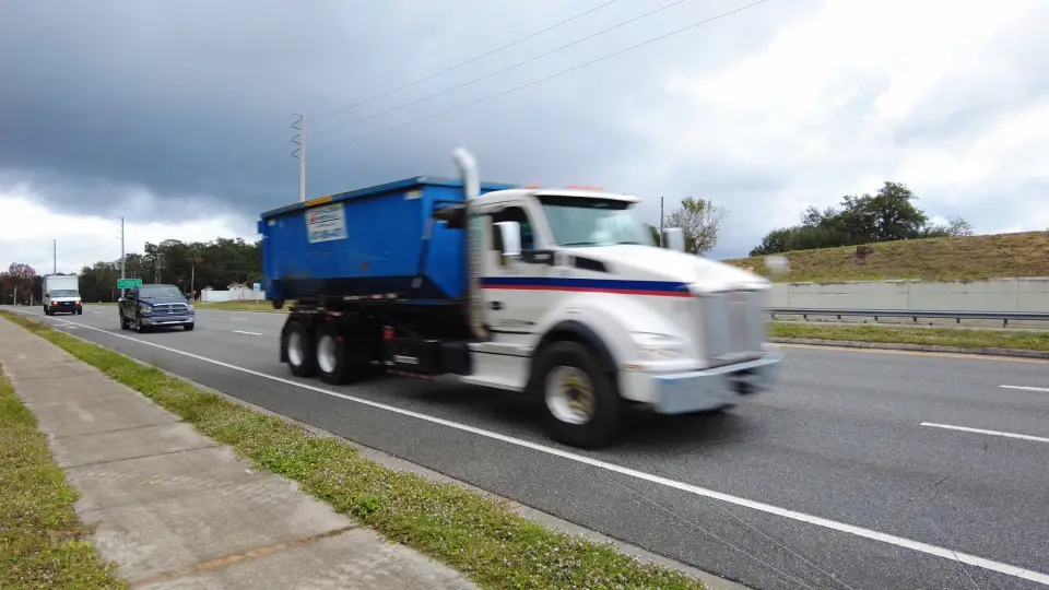White dump truck driving by on a highway in a Traffic Heaven road noise video